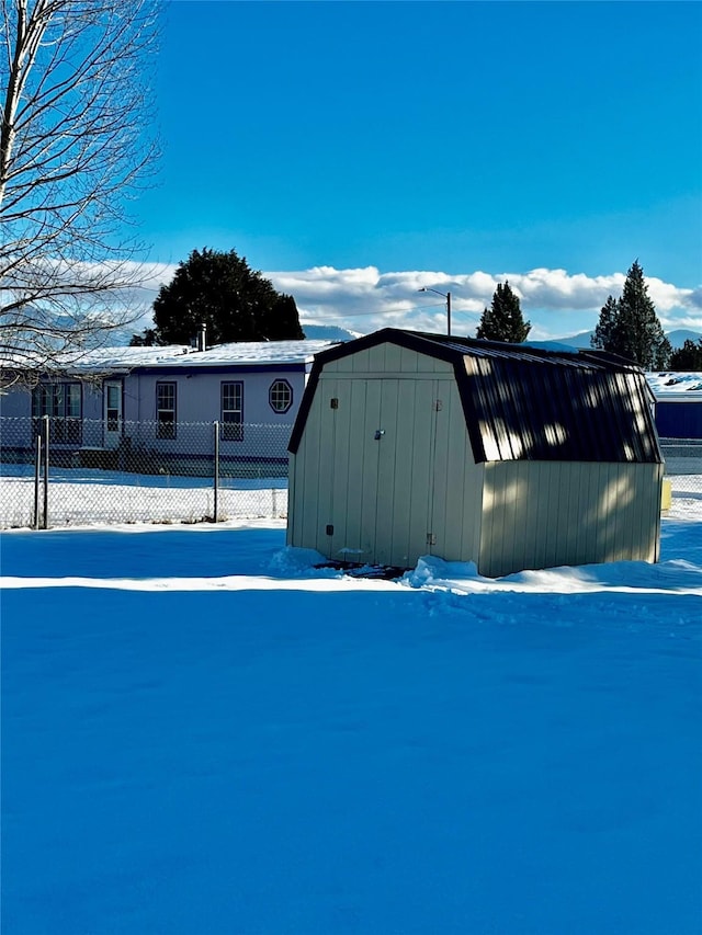 exterior space with a storage shed