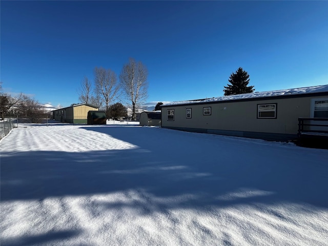 view of yard covered in snow