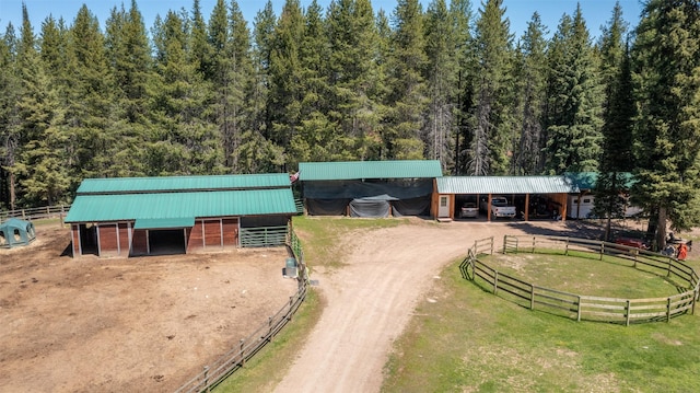 view of stable with a rural view