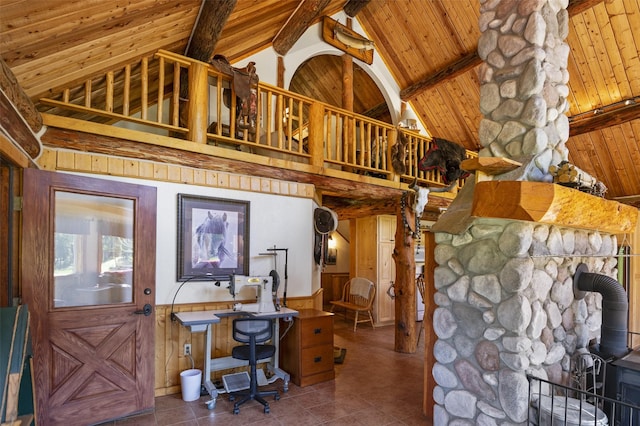 tiled living room with wood ceiling, wooden walls, high vaulted ceiling, a wood stove, and beam ceiling