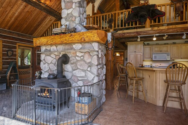 sunroom featuring wooden ceiling and heating unit