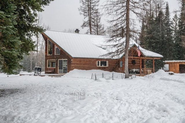 view of snow covered property