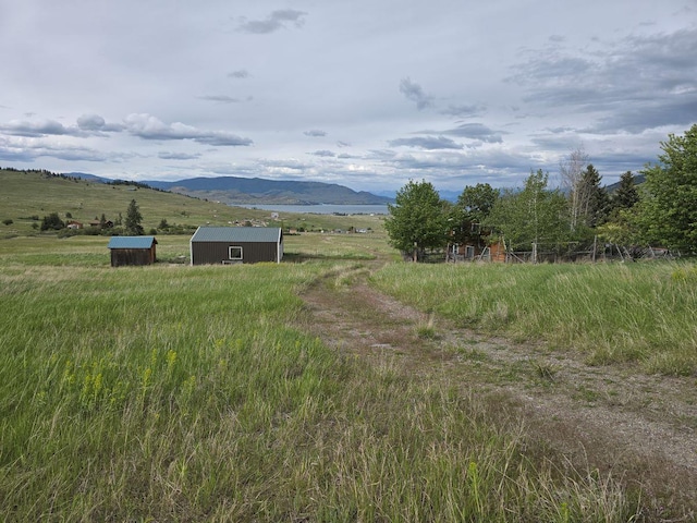 property view of mountains featuring a rural view