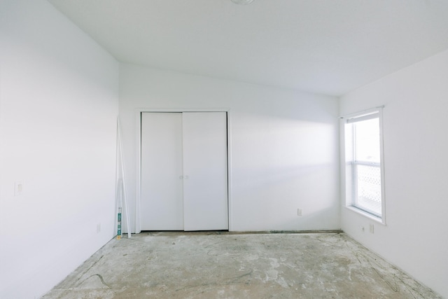 unfurnished bedroom with a closet