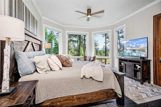 bedroom featuring crown molding and ceiling fan