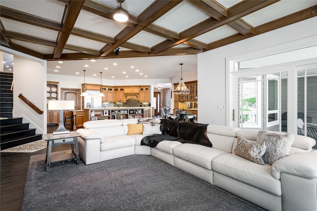 living room featuring recessed lighting, beam ceiling, coffered ceiling, and stairs