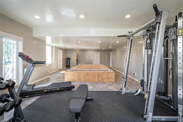 workout area featuring visible vents, recessed lighting, and baseboards