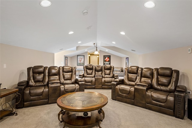 carpeted home theater room featuring lofted ceiling and recessed lighting