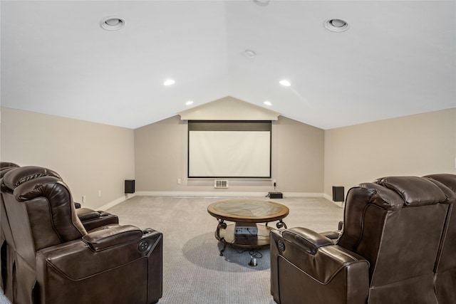 carpeted home theater with recessed lighting, baseboards, and vaulted ceiling