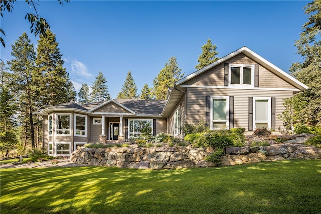 view of front of property with a yard