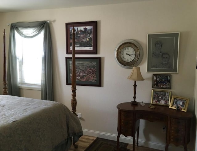 200 Clayton St, Plains, MT 59859 - bedroom featuring baseboards and wood finished floors