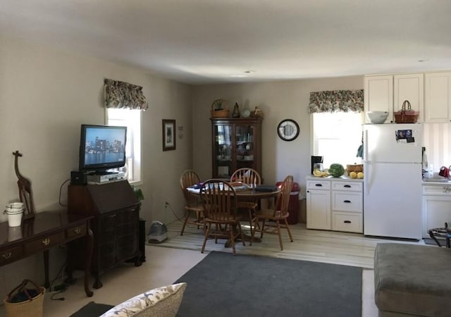 dining room with plenty of natural light