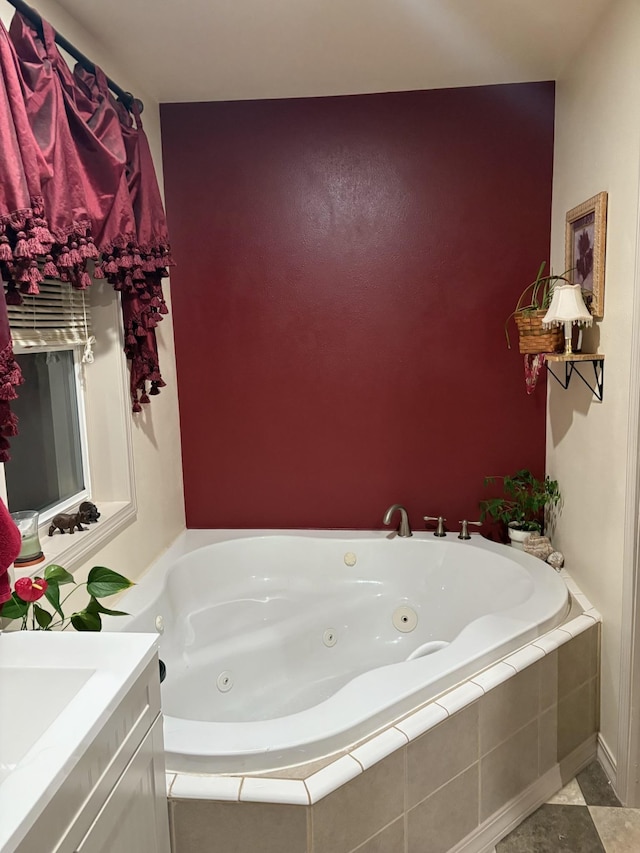 bathroom featuring tile patterned floors and a relaxing tiled tub