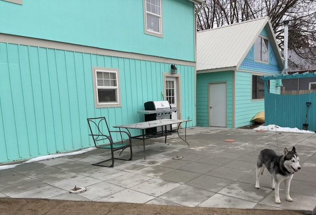 rear view of property with a patio