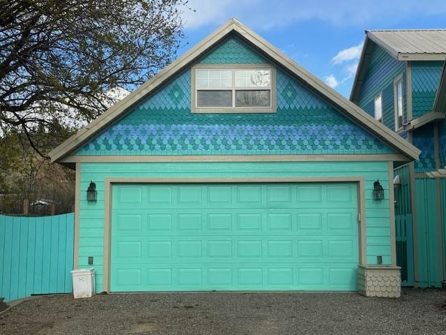 200 Clayton St, Plains, MT 59859 - garage featuring fence