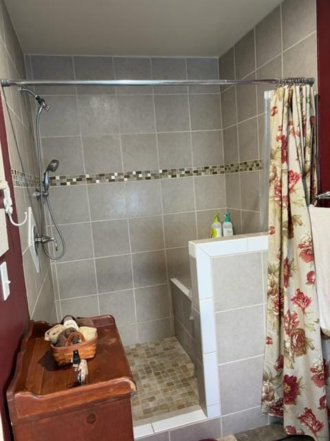 bathroom featuring curtained shower