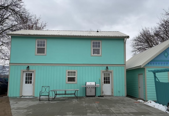 200 Clayton St, Plains, MT 59859 - back of house featuring a patio and metal roof