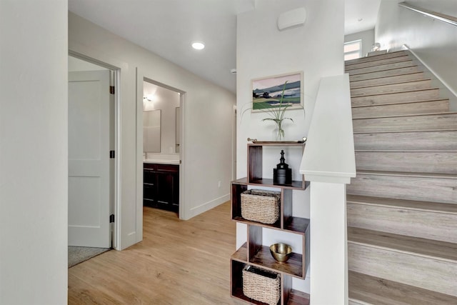 stairs with wood-type flooring