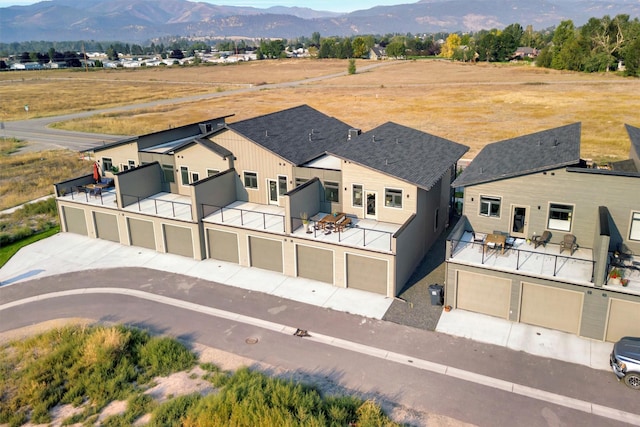 bird's eye view with a mountain view