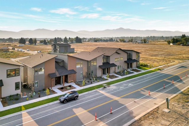 birds eye view of property featuring a mountain view