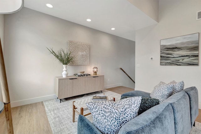 living room with light hardwood / wood-style floors