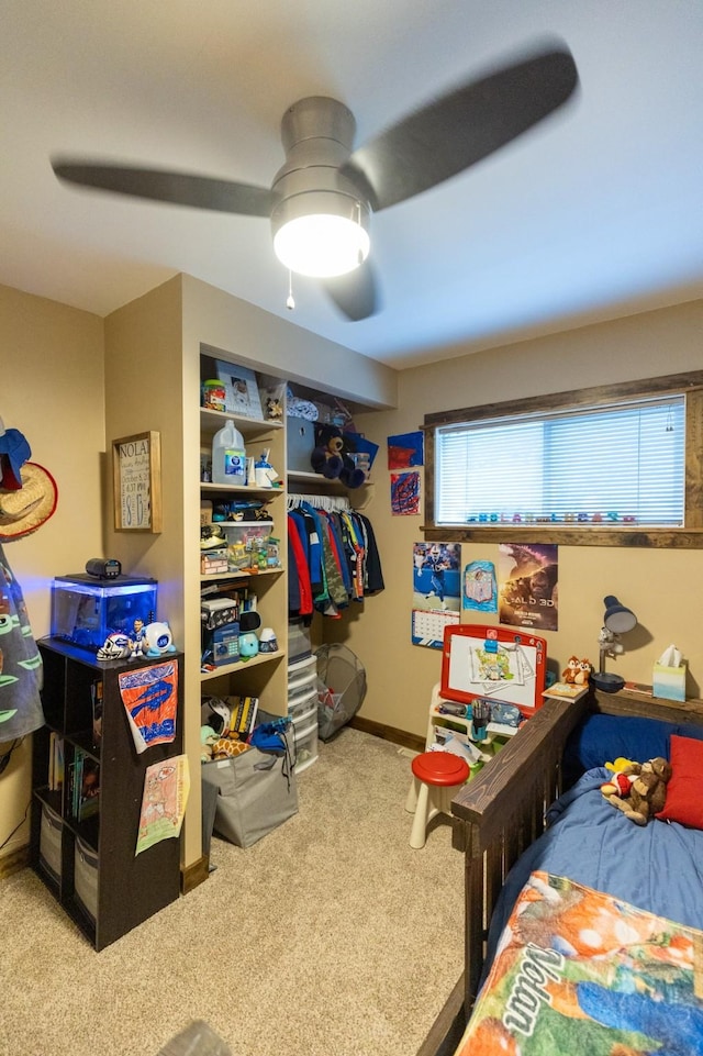 carpeted bedroom featuring ceiling fan