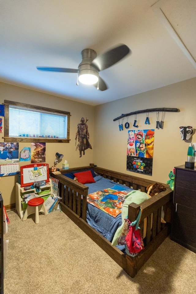 carpeted bedroom featuring ceiling fan