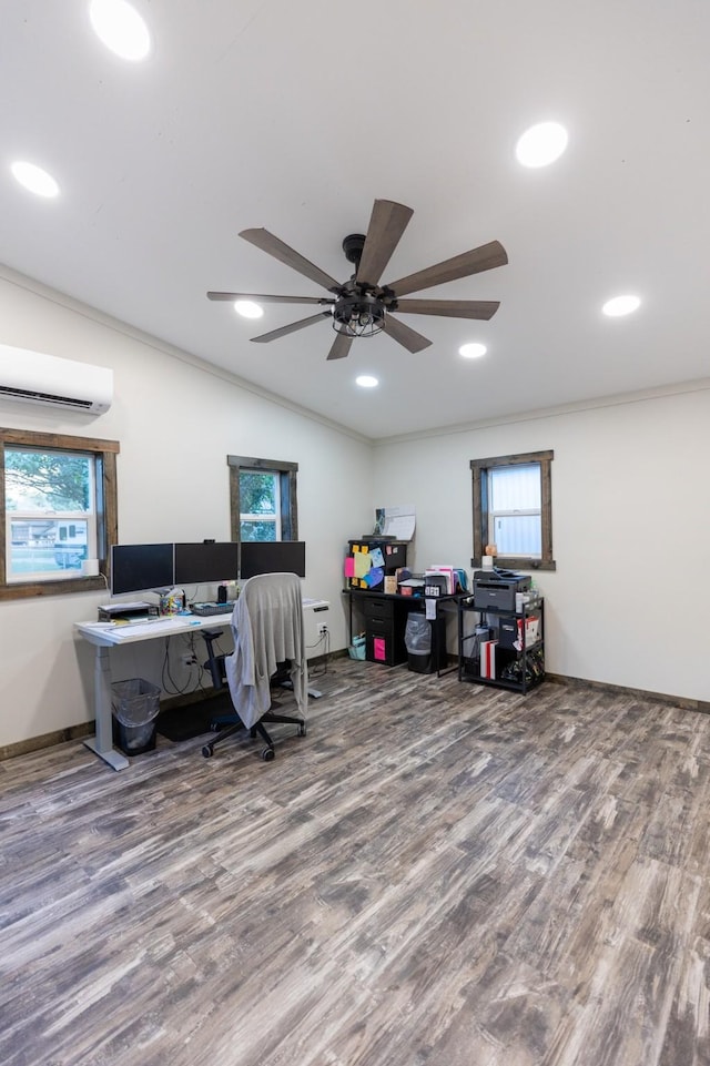 home office featuring ornamental molding, a wall unit AC, ceiling fan, and hardwood / wood-style floors