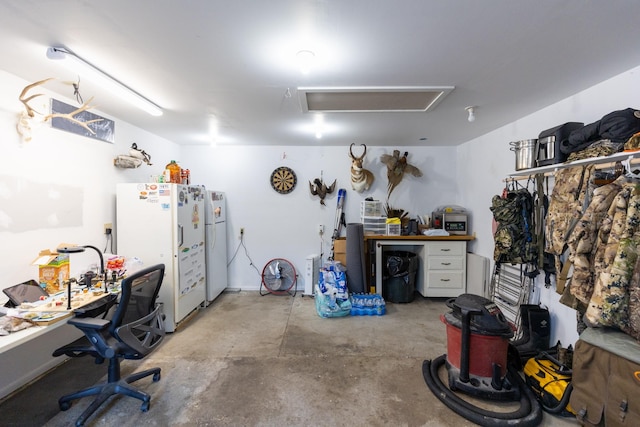 garage featuring white refrigerator