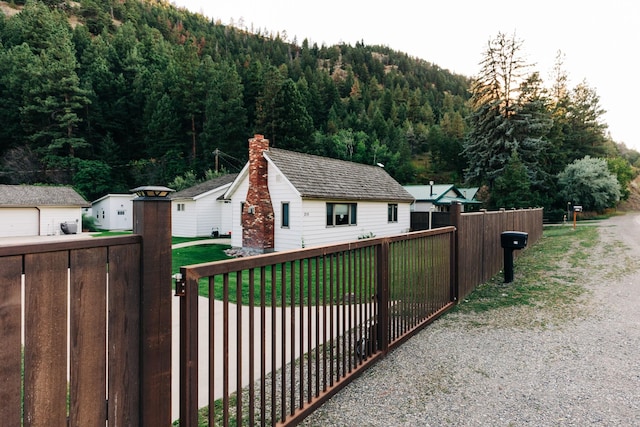 view of gate with a mountain view