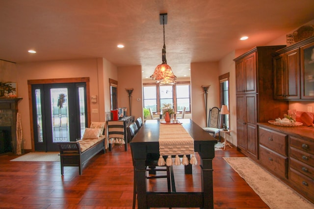 dining room with dark wood-type flooring