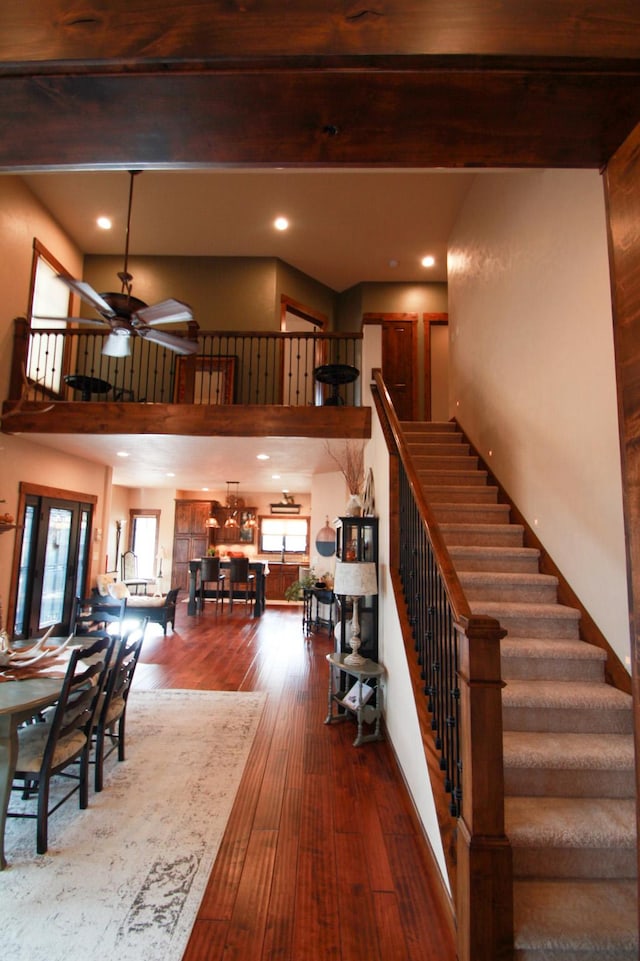 interior space featuring hardwood / wood-style floors and ceiling fan