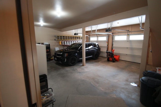 garage featuring a garage door opener