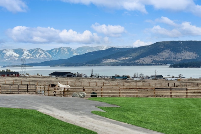 view of mountain feature featuring a rural view and a water view