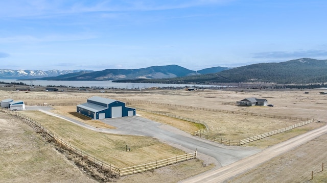 view of mountain feature with a rural view