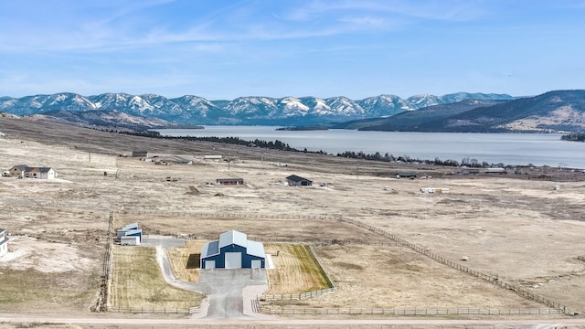 property view of mountains with a water view and a rural view