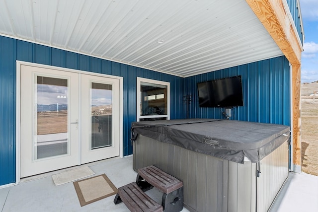 view of patio featuring french doors and a hot tub