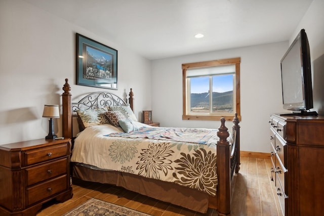 bedroom featuring hardwood / wood-style floors