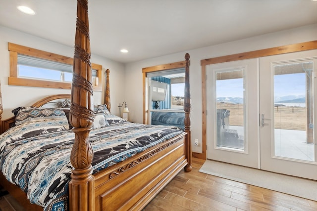 bedroom featuring french doors and access to exterior