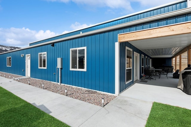 view of home's exterior featuring a patio area