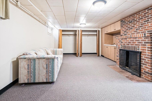 interior space with a brick fireplace