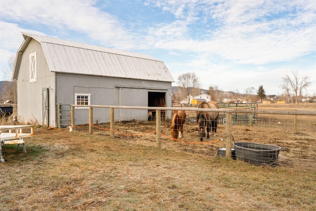 view of outbuilding with a rural view