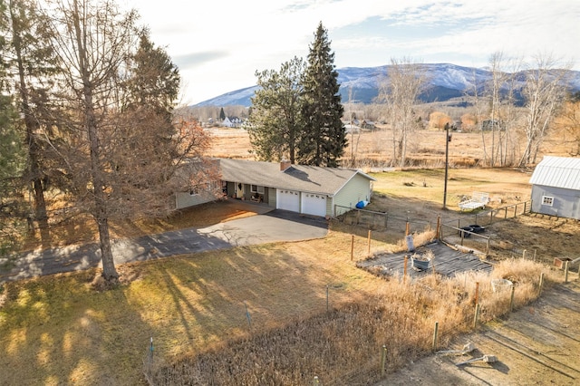 aerial view featuring a rural view and a mountain view