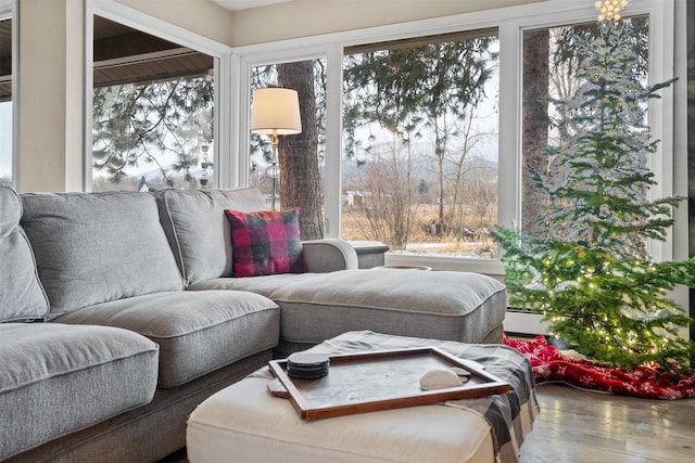 sunroom featuring baseboard heating