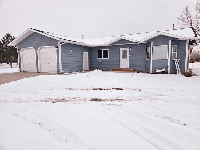 single story home with an attached garage