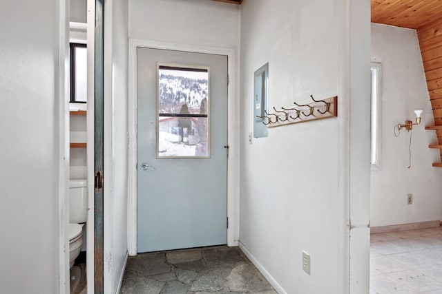 doorway to outside featuring wooden ceiling