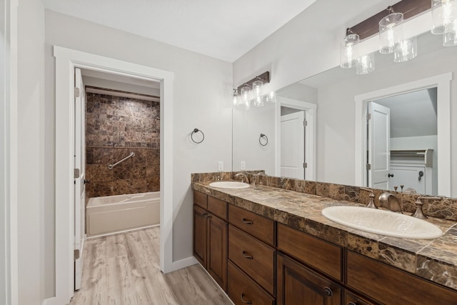 bathroom featuring hardwood / wood-style flooring and vanity