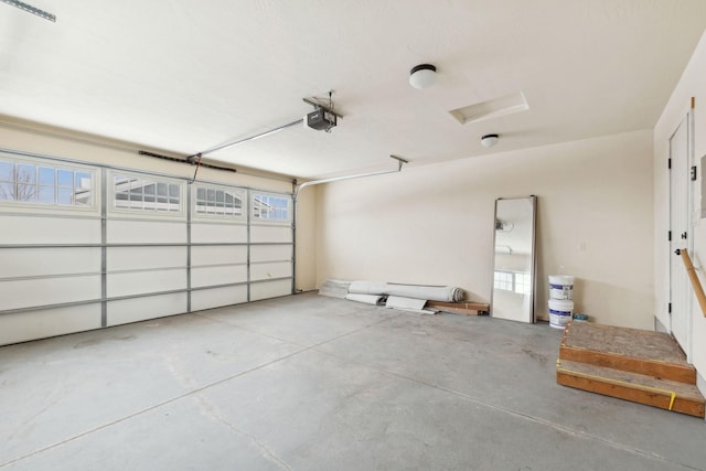 garage featuring a garage door opener