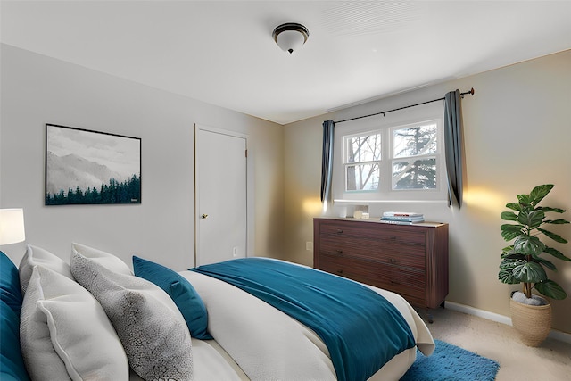 bedroom with light colored carpet