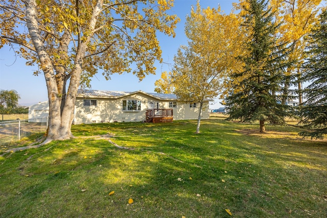 view of yard featuring a deck